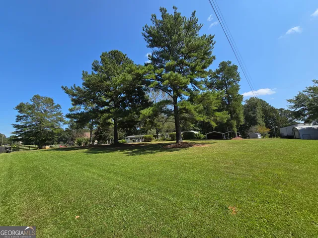 a view of balcony with wooden floor