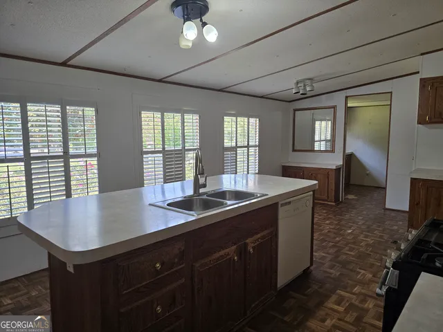 a bathroom with a glass door shower