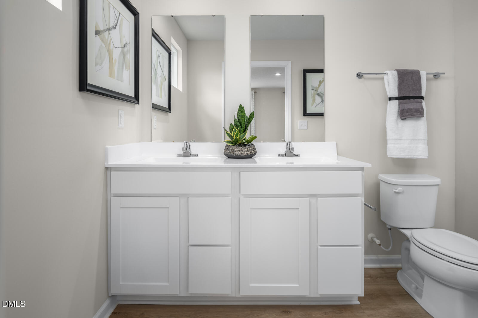 4070 Dragonfly Road Bailey, NC 27807 - Photo 15 of 20 a bathroom with a sink a toilet and mirror