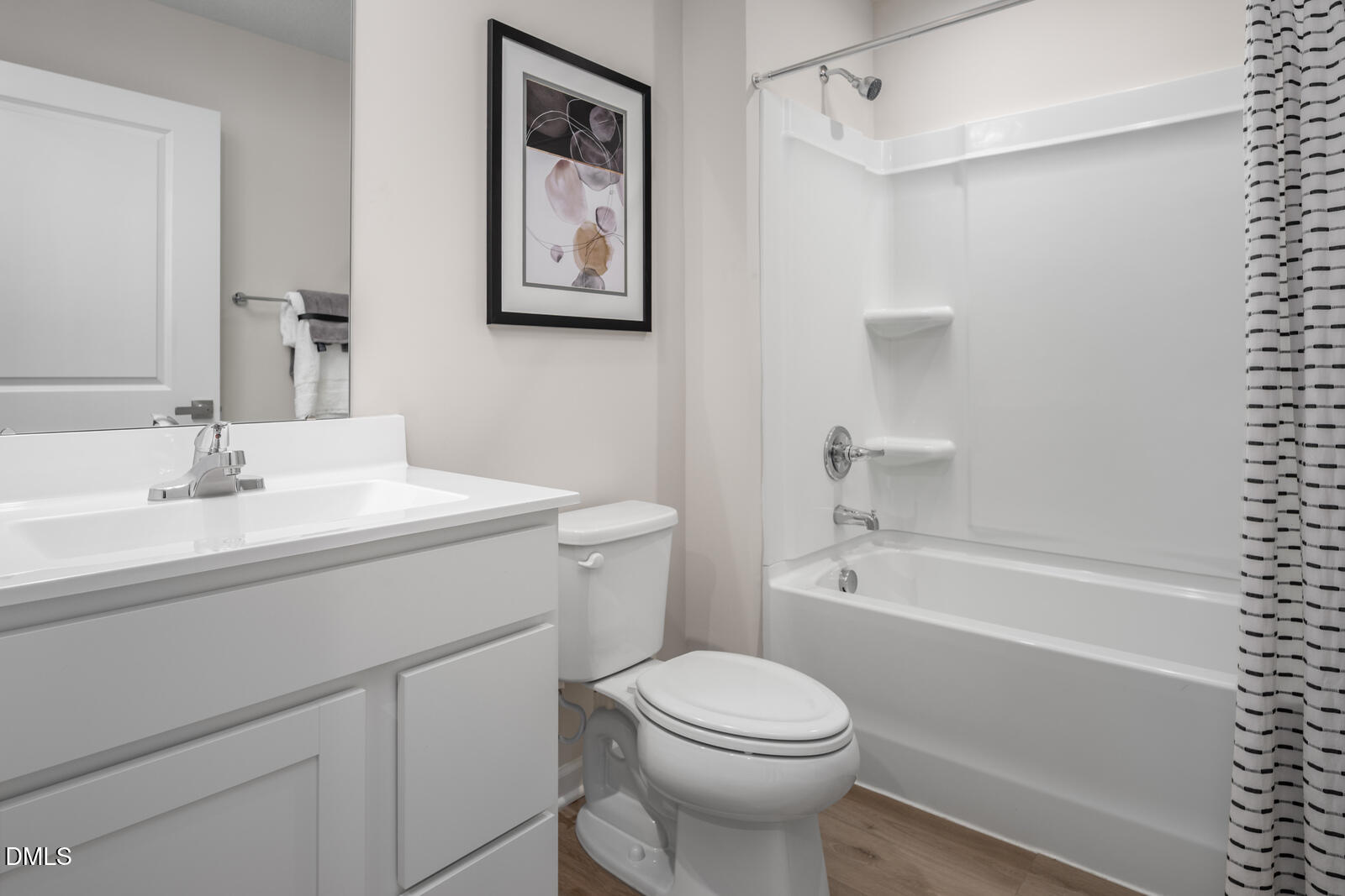 4070 Dragonfly Road Bailey, NC 27807 - Photo 18 of 20 a bathroom with a sink a toilet and shower