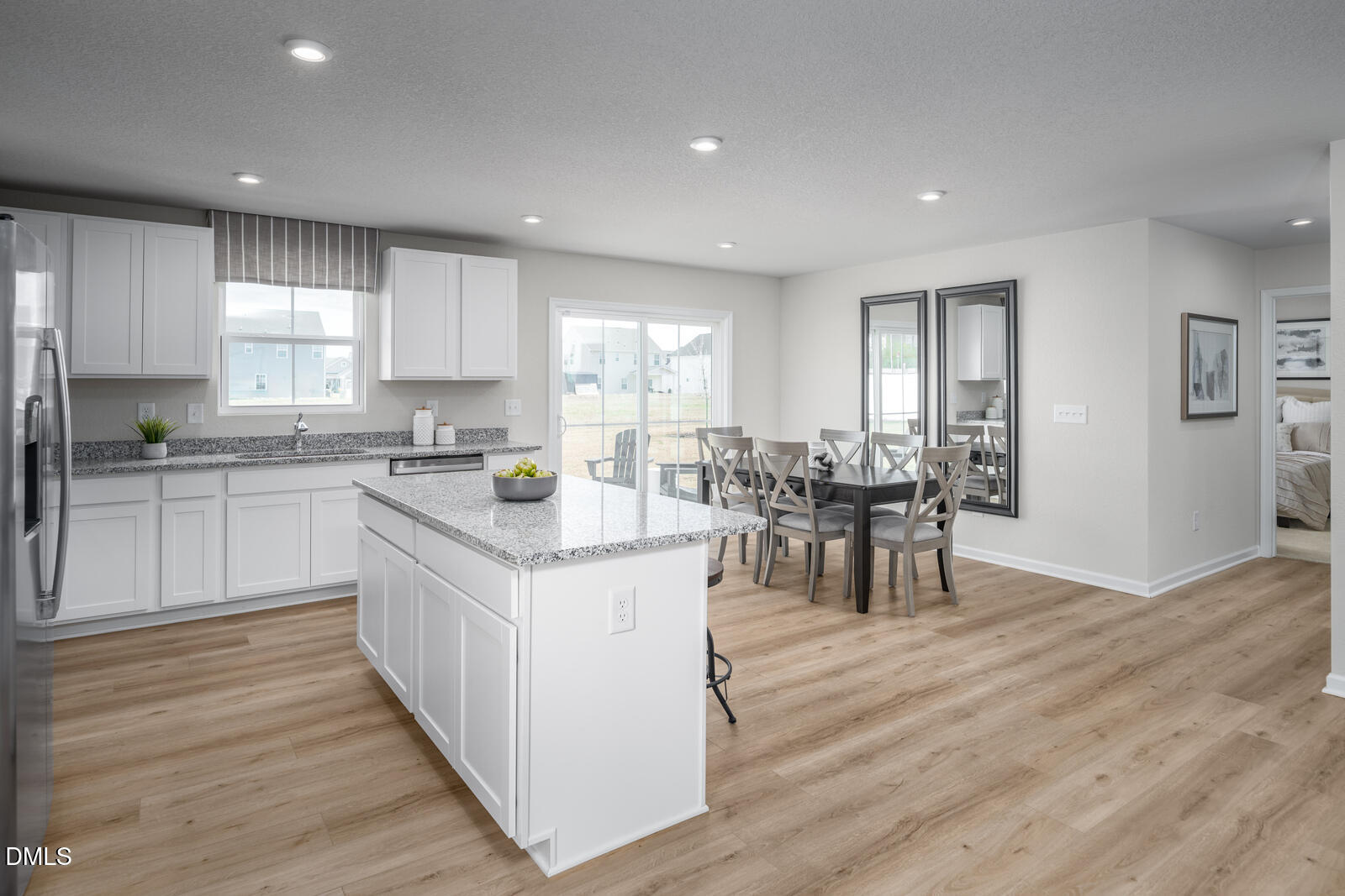 4070 Dragonfly Road Bailey, NC 27807 - Photo 5 of 20 a kitchen with white cabinets and sink