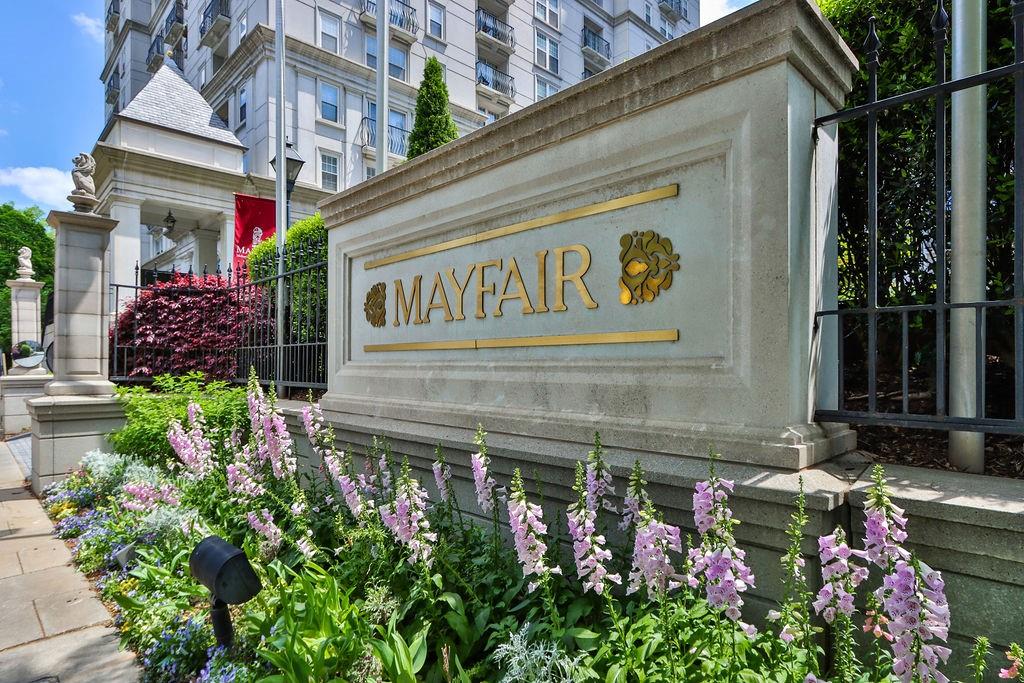 195 14th Street Northeast, Unit 708 Atlanta, GA 30309 - Photo 1 of 1 a sign that is in front of flowers