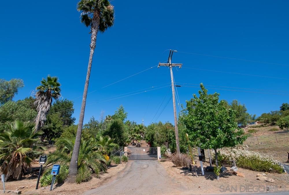 15330 Markar Road Poway, CA 92064 - Photo 2 of 24 Gated driveway with electric fence.