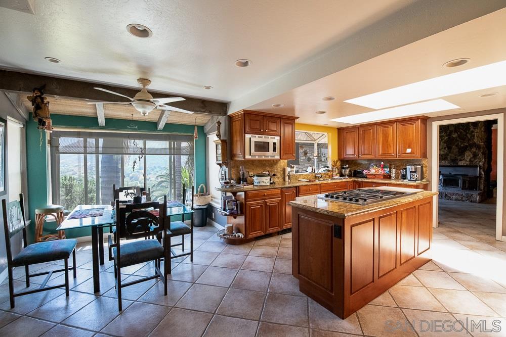 15330 Markar Road Poway, CA 92064 - Photo 11 of 24 There is also a nice eating area in the kitchen with views. The kitchen has been nicely upgraded.