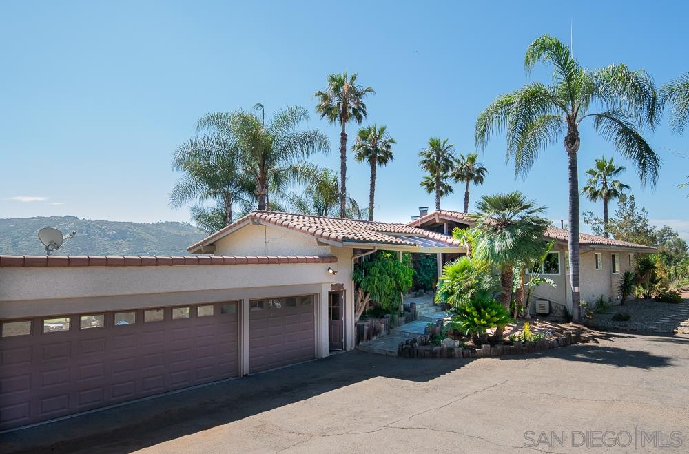 15330 Markar Road Poway, CA 92064 - Photo 4 of 24 This is a 3 car, attached garage and there is also another garage that is unattached!