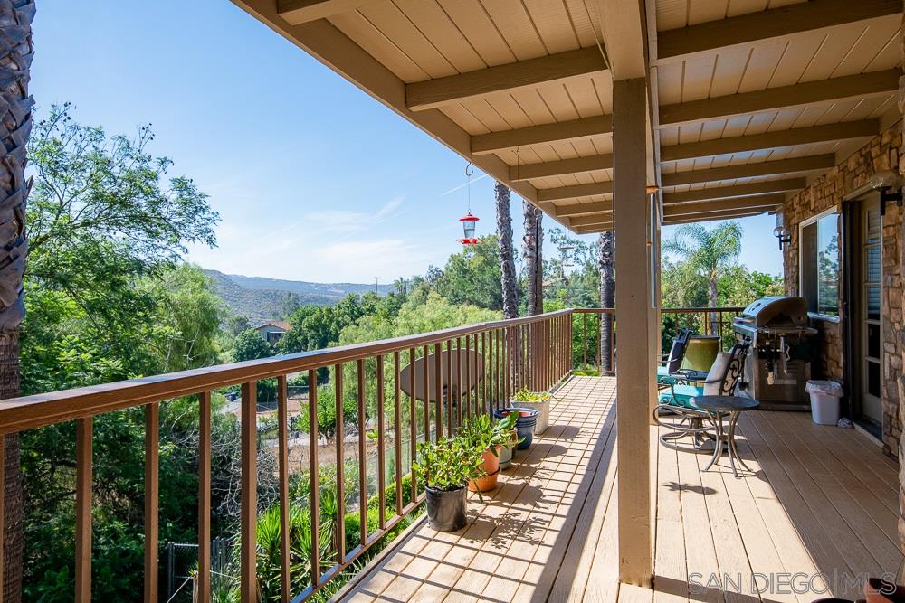 15330 Markar Road Poway, CA 92064 - Photo 7 of 24 Views, views and more views! This deck spans from the dining room, to the living room and then to the master bedroom. Enter from any location.