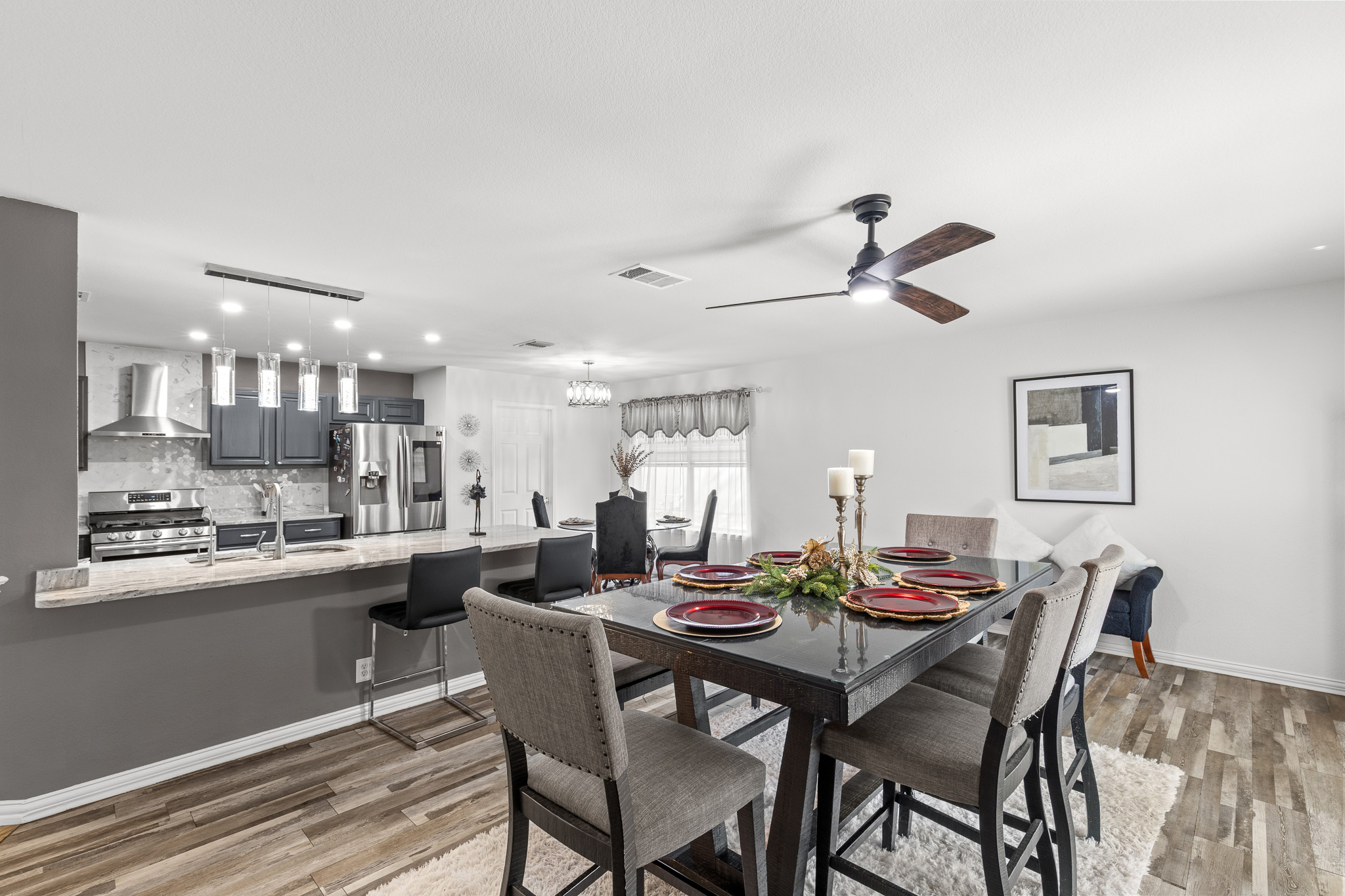 615 Barbara Way Bastrop, TX 78602 - Photo 9 of 27 Dining area with light wood-type flooring, a chandelier, and recessed lighting