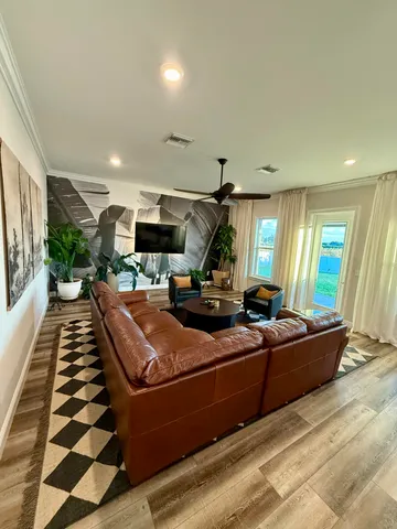 a room with lots of chairs and a projector screen