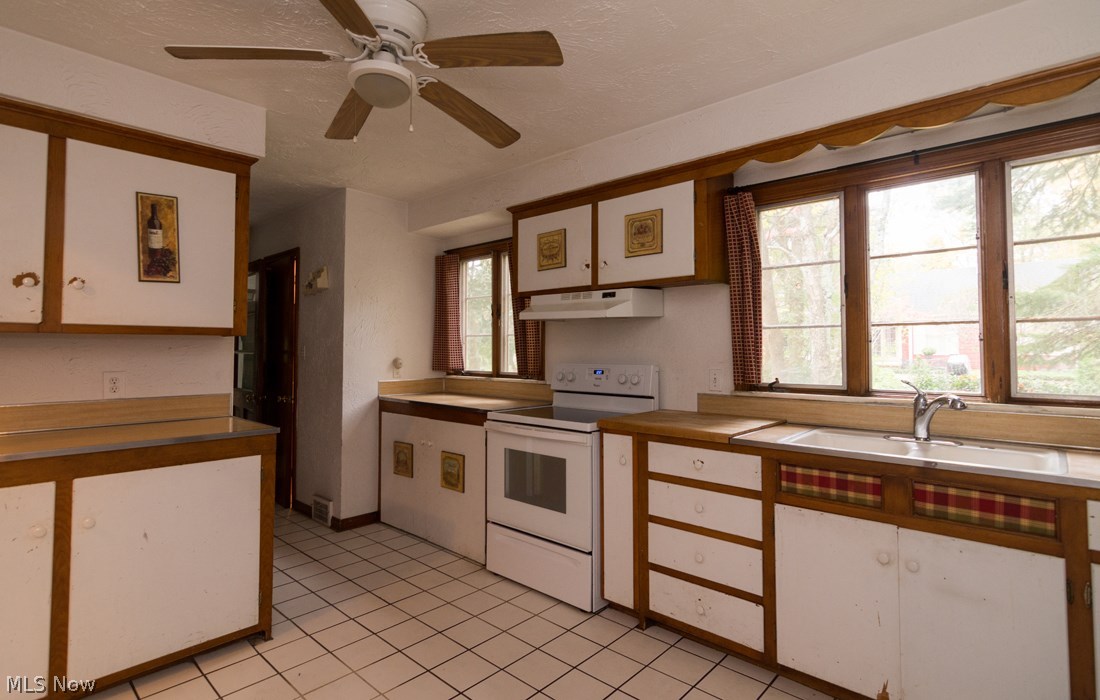 30200 Smithfield Road Chagrin Falls, OH 44022 - Photo 7 of 27 The kitchen has an abundance of cabinet and countertop space.