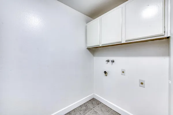 a view of a small space with wooden floor