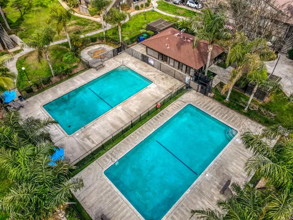 a view of a backyard with sitting area
