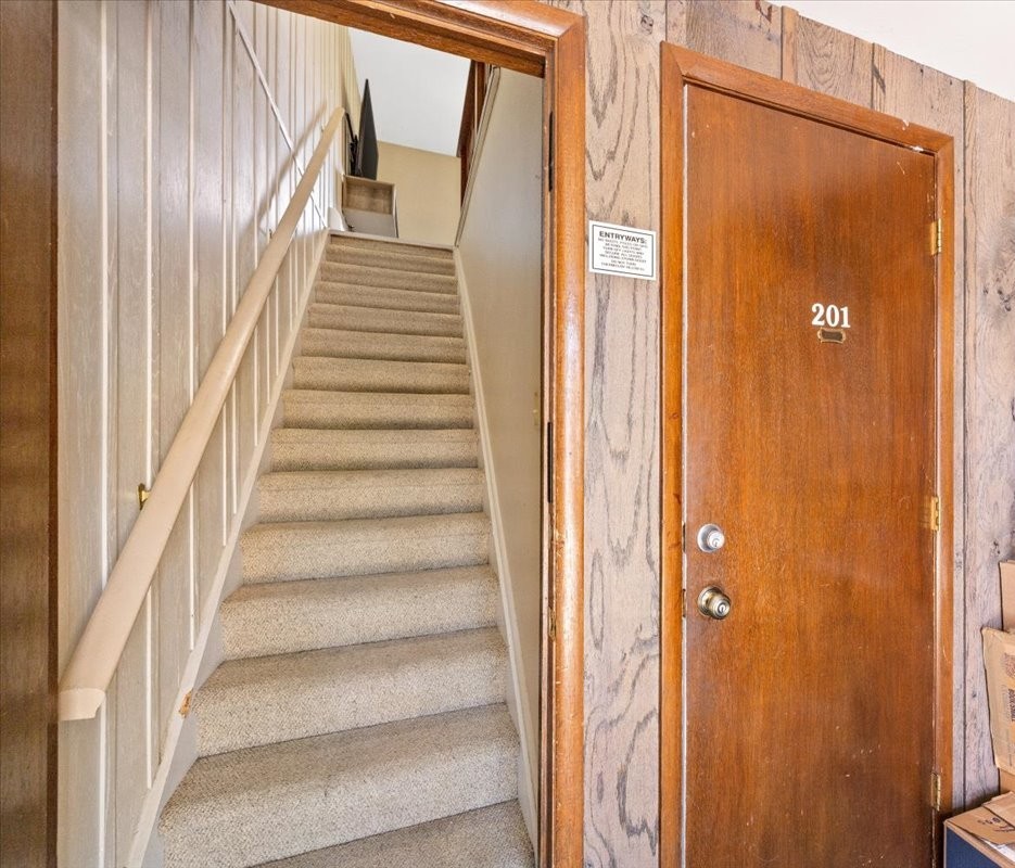 110 Evergreen Road, Unit 301 Dillon, CO 80435 - Photo 17 of 23 a view of staircase with wooden floor and stairs
