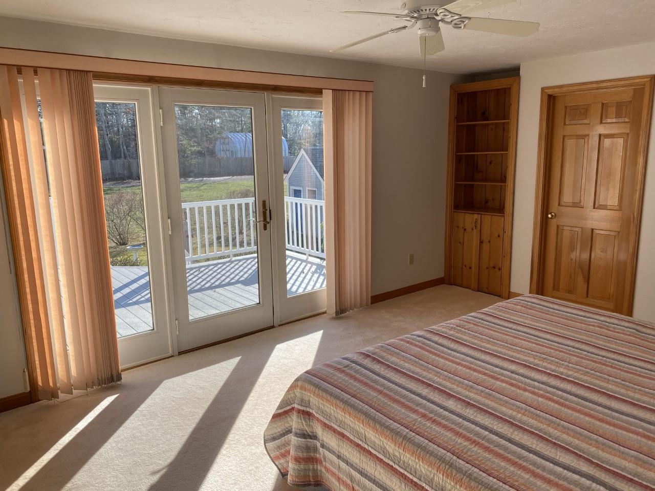 35 Catskill Road Buzzards Bay, MA 02532 - Photo 22 of 43 a view of a bedroom with wooden floor and windows