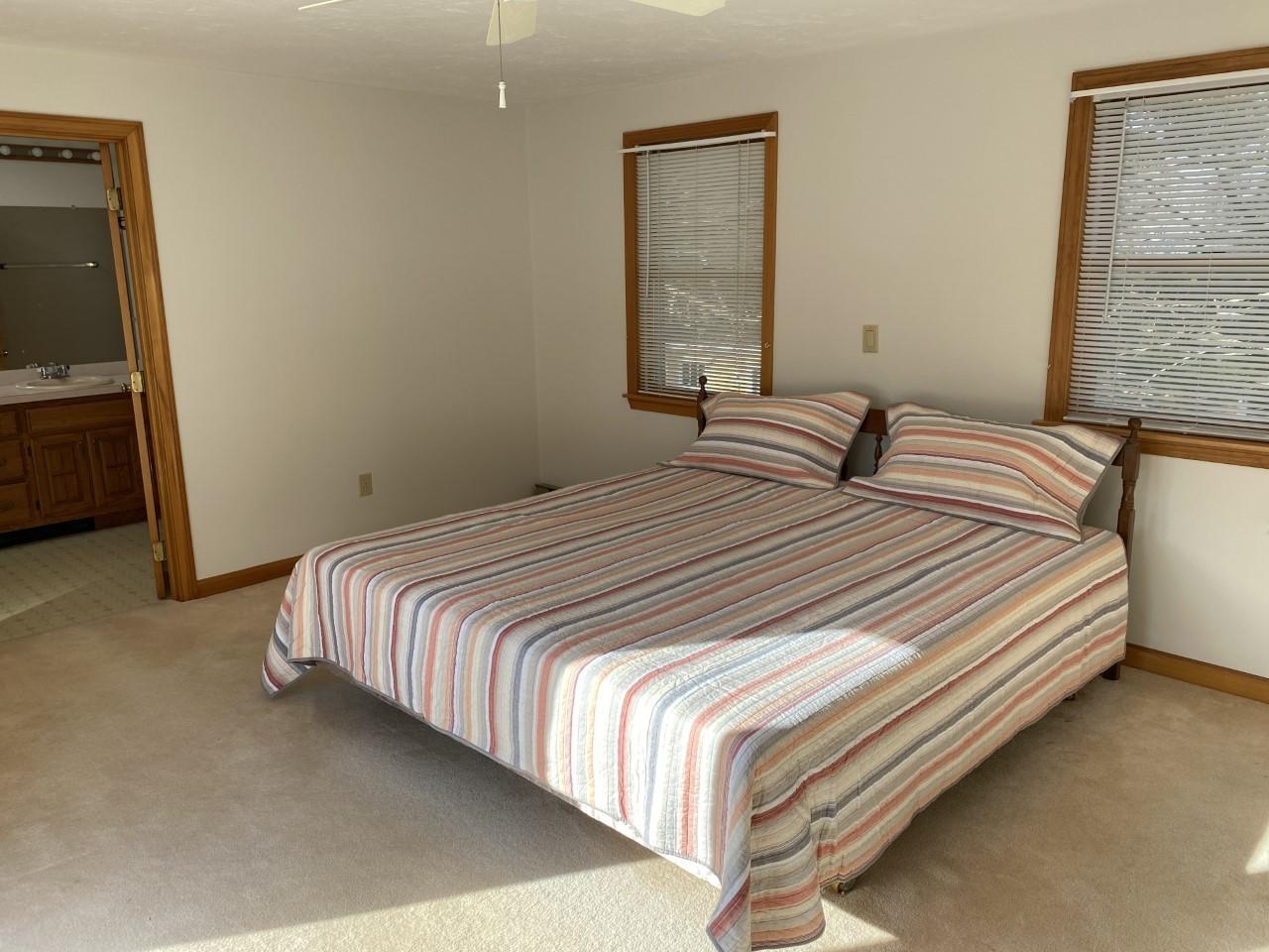 35 Catskill Road Buzzards Bay, MA 02532 - Photo 25 of 43 a bedroom with a bed and a tv