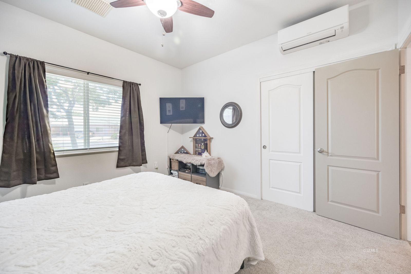 400 Acacia Street Ridgecrest, CA 93555 - Photo 24 of 45 a bedroom with a bed and a window