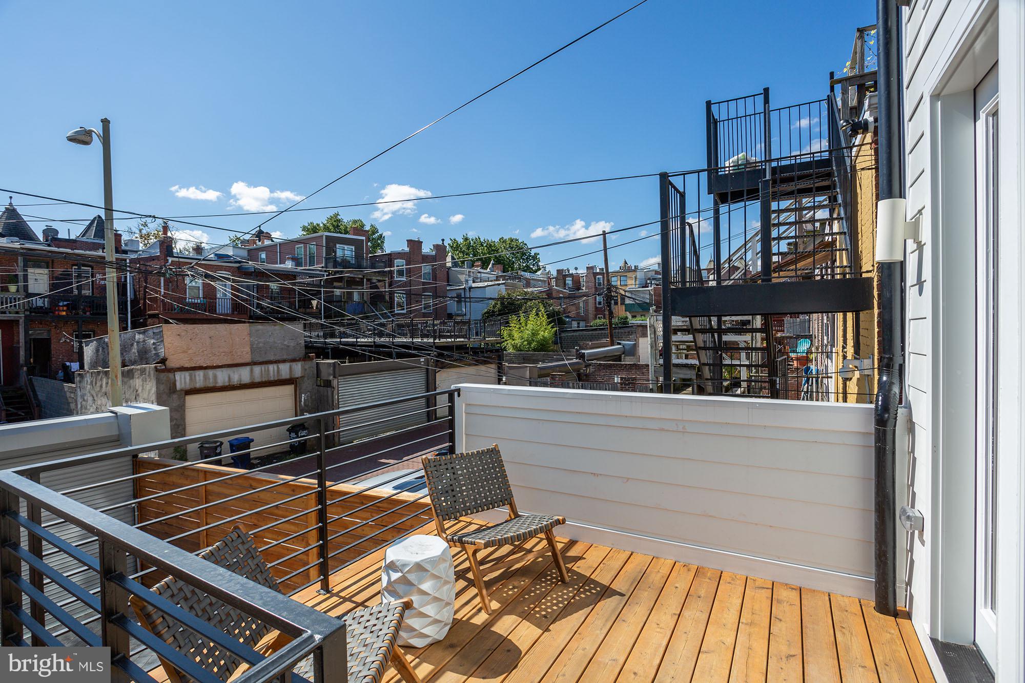1134 Columbia Road Northwest, Unit 1 Washington, DC 20009 - Photo 3 of 26 Amazing private deck off of the living room