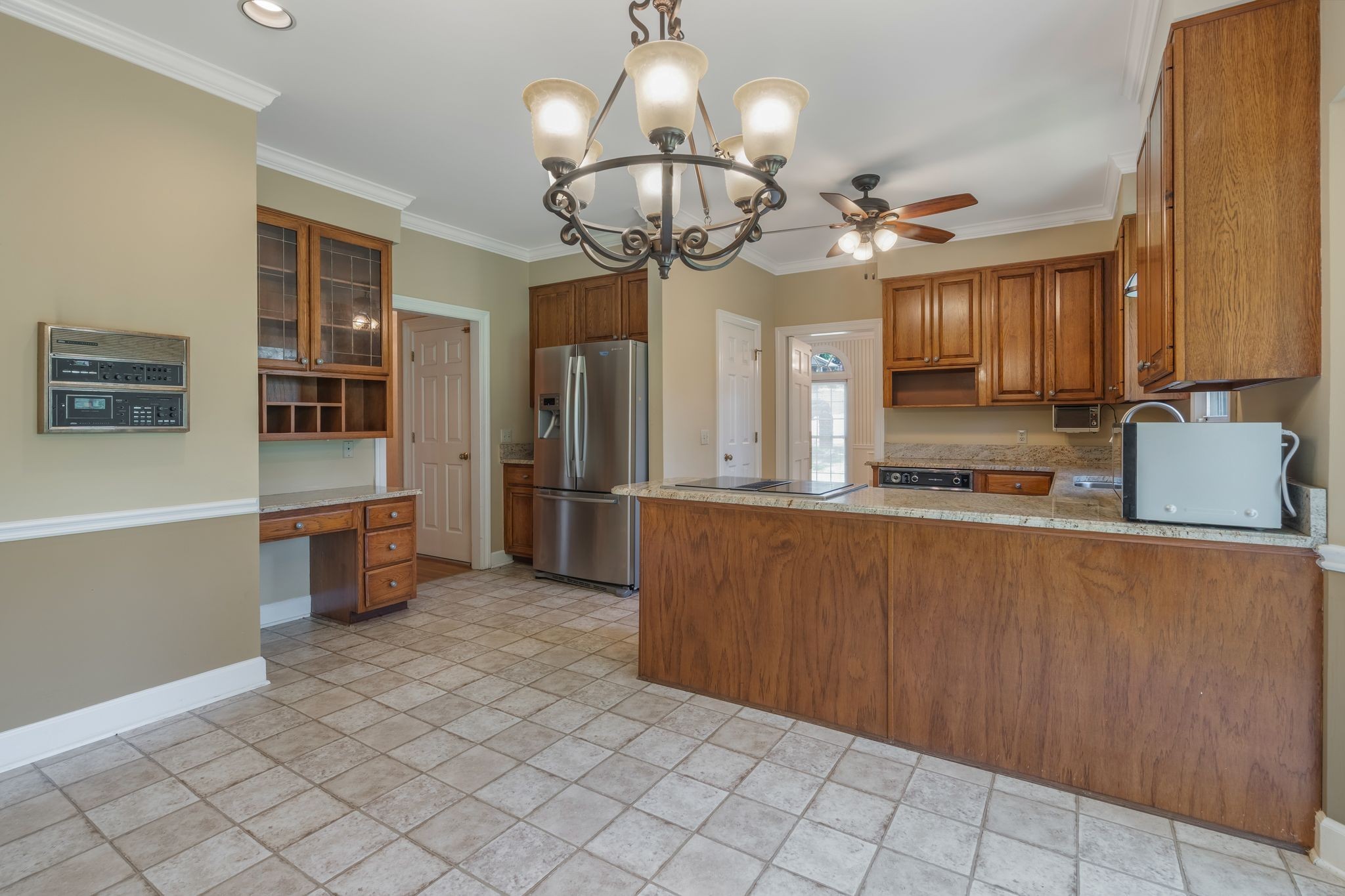709 Heather Spring Brentwood, TN 37027 - Photo 15 of 43 a kitchen with stainless steel appliances a refrigerator and microwave