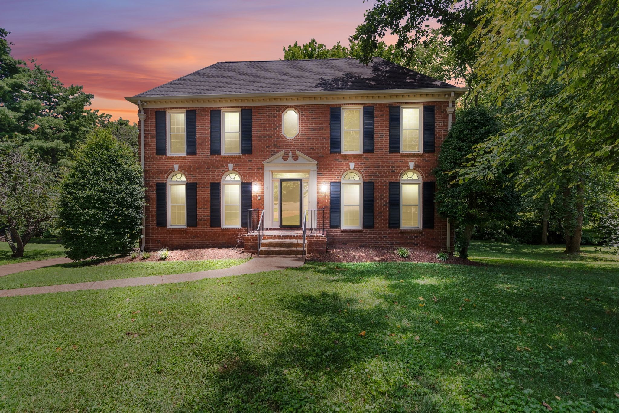 709 Heather Spring Brentwood, TN 37027 - Photo 2 of 43 a front view of a house with a yard