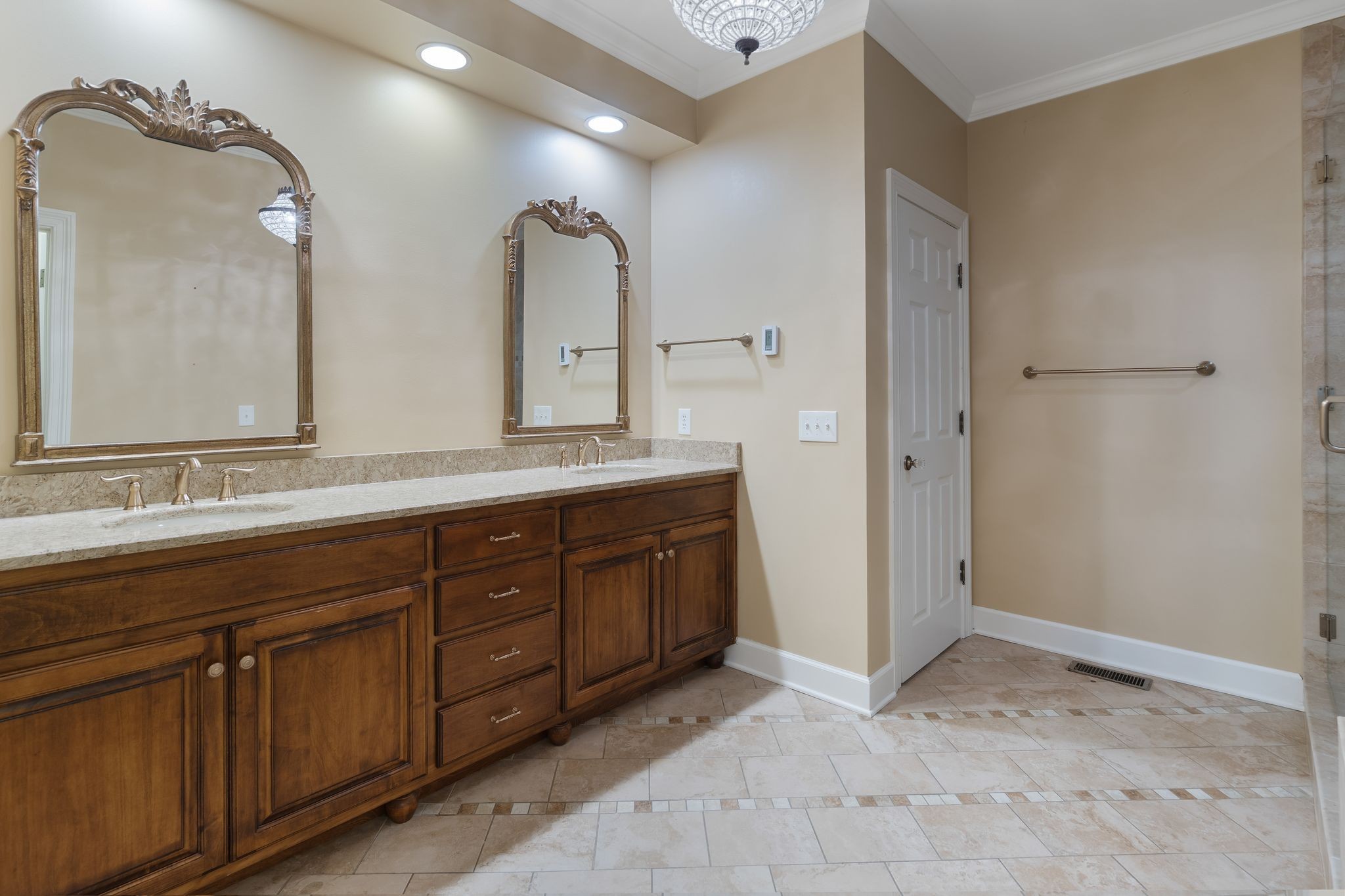 709 Heather Spring Brentwood, TN 37027 - Photo 21 of 43 a spacious bathroom with double sink and a mirror