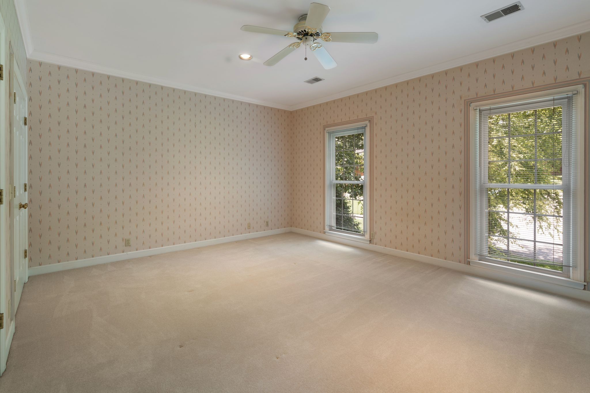 709 Heather Spring Brentwood, TN 37027 - Photo 25 of 43 an empty room with windows and ceiling fan