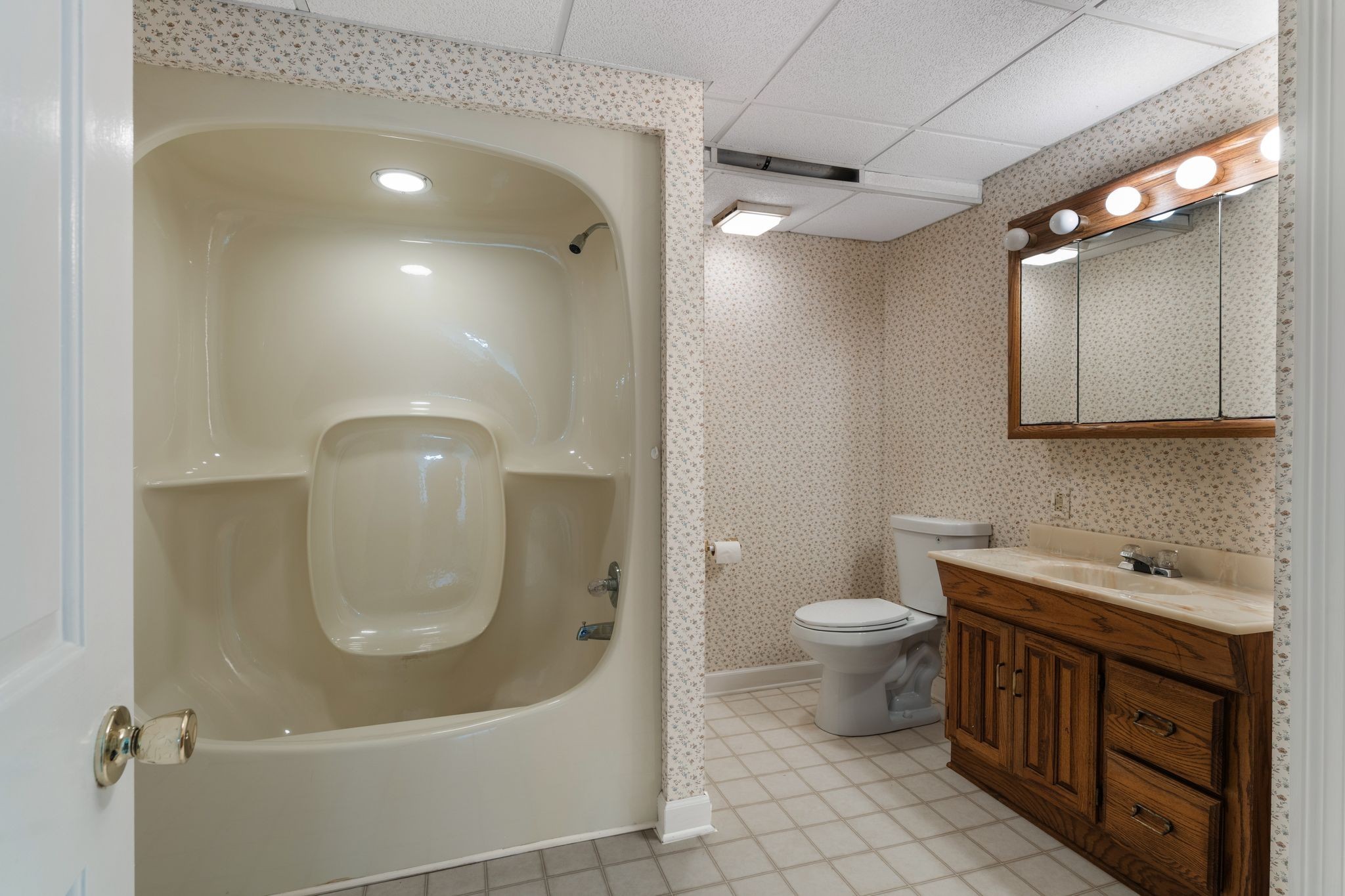 709 Heather Spring Brentwood, TN 37027 - Photo 35 of 43 a bathroom with a toilet a sink and mirror