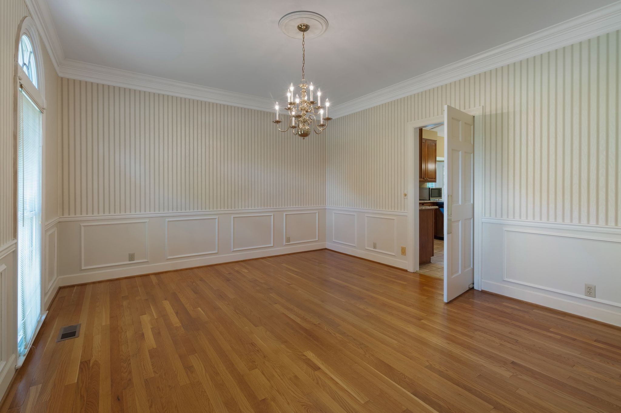709 Heather Spring Brentwood, TN 37027 - Photo 9 of 43 wooden floor in an empty room with a window