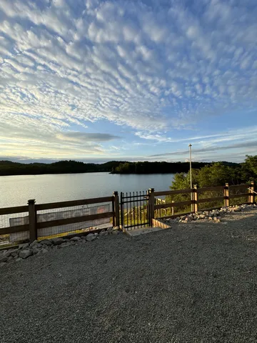 a view of a terrace with a lake