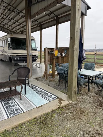 a view of a porch with furniture