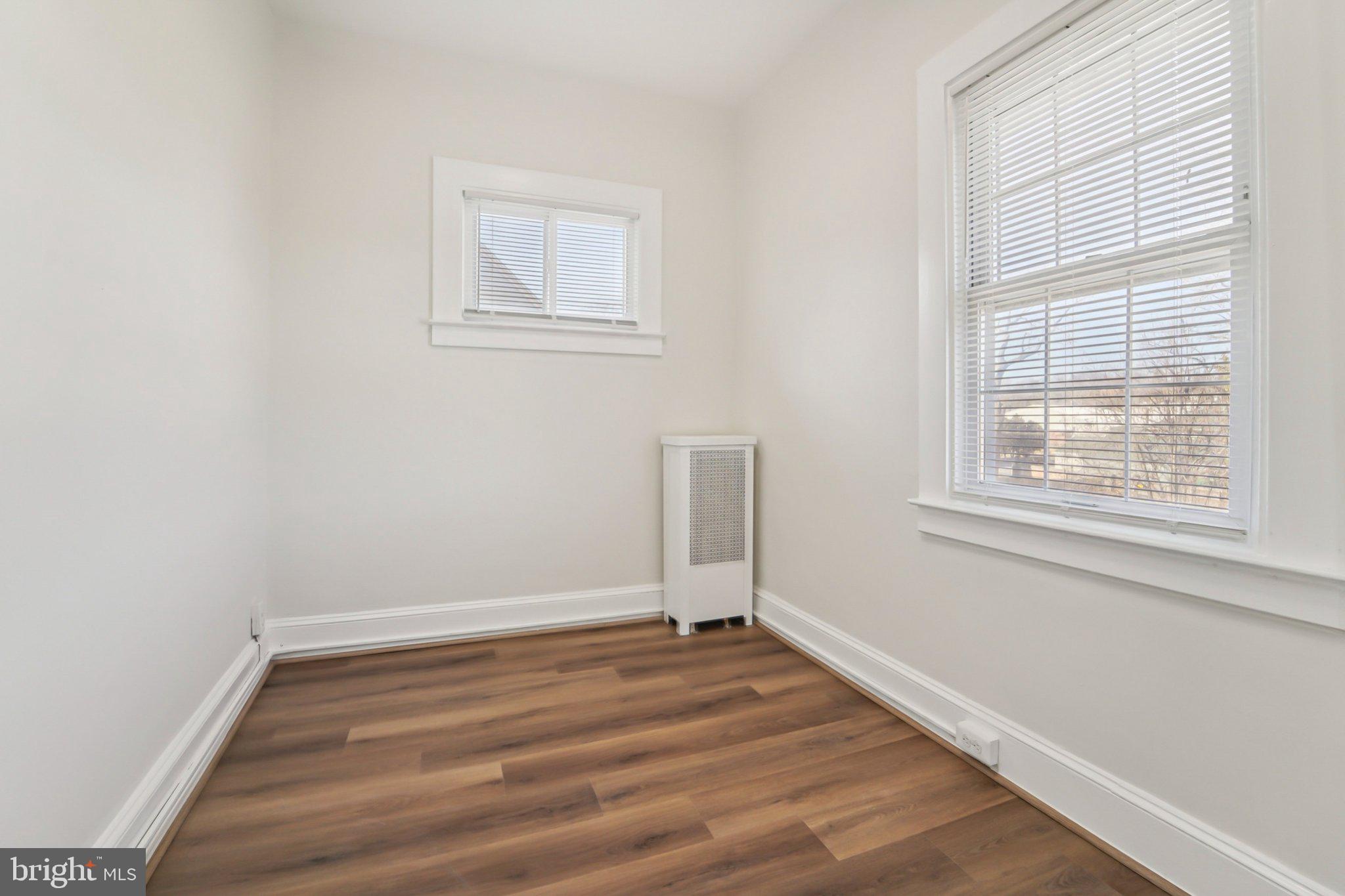 14 Summerfield Road Gwynn Oak, MD 21207 - Photo 21 of 54 a view of a room with wooden floor and windows