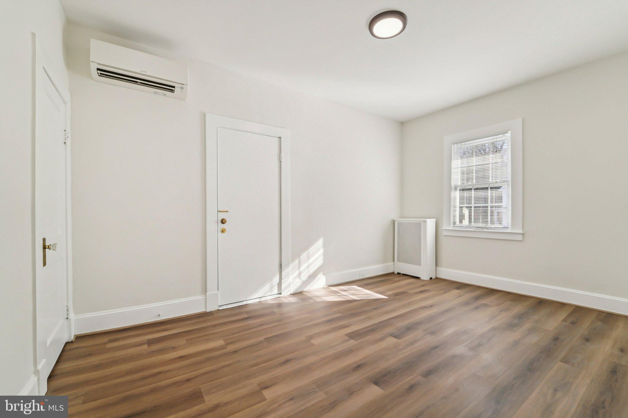 14 Summerfield Road Gwynn Oak, MD 21207 - Photo 23 of 54 a view of empty room with wooden floor