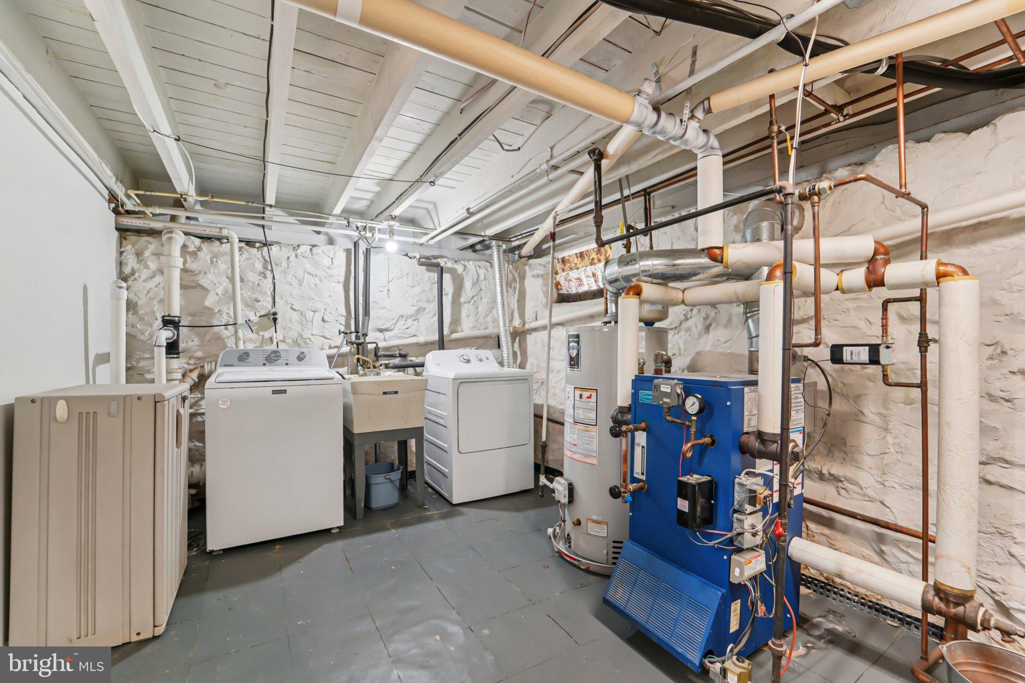 14 Summerfield Road Gwynn Oak, MD 21207 - Photo 27 of 54 a utility room with dryer and washer