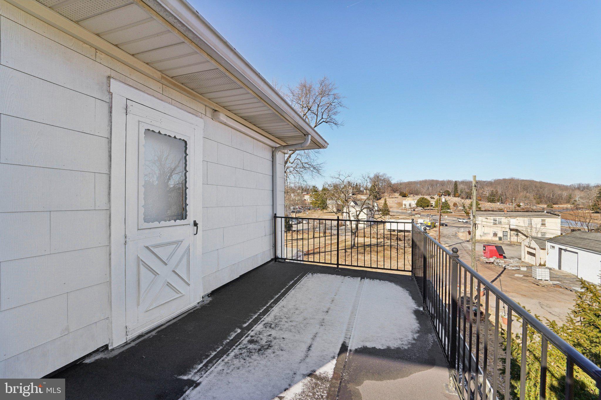 14 Summerfield Road Gwynn Oak, MD 21207 - Photo 33 of 54 a view of a balcony with city view