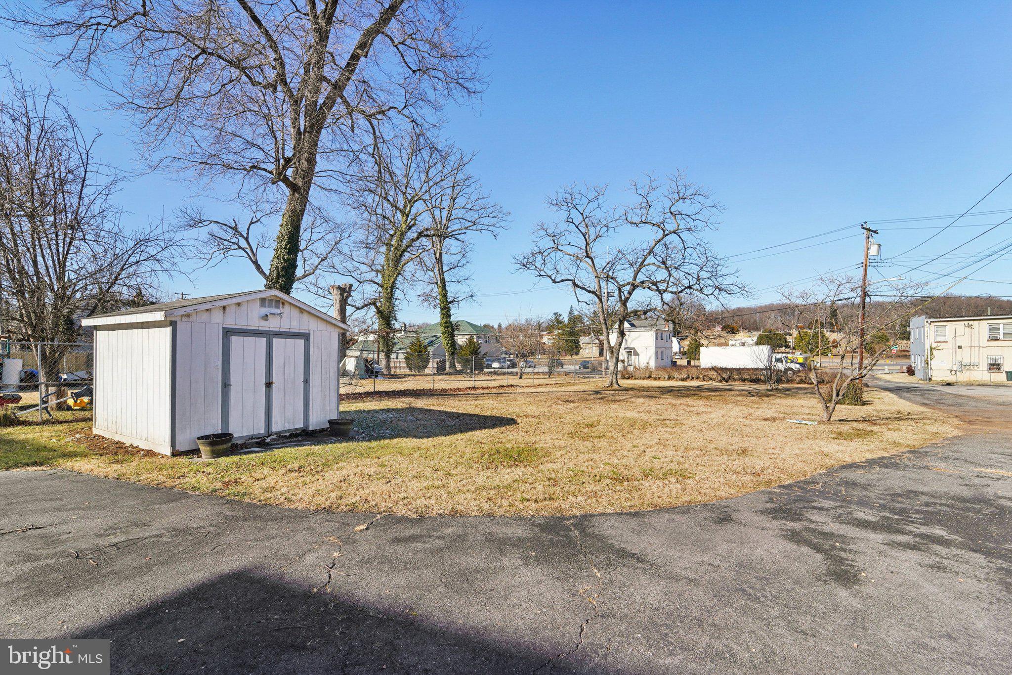 14 Summerfield Road Gwynn Oak, MD 21207 - Photo 35 of 54 a view of large parking space with a house
