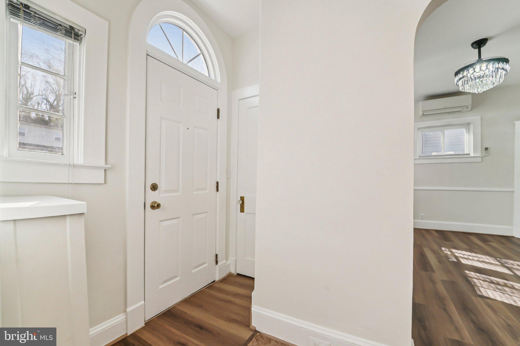 14 Summerfield Road Gwynn Oak, MD 21207 - Photo 5 of 54 a view of front door with wooden floor