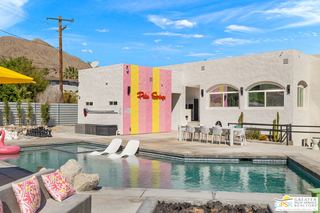 775 West Racquet Club Road Palm Springs, CA 92262 - Photo 2 of 44 a view of a kitchen with patio furniture