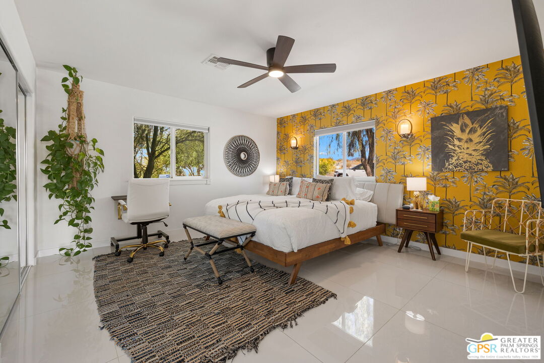 775 West Racquet Club Road Palm Springs, CA 92262 - Photo 25 of 44 a living room with furniture and a potted plant