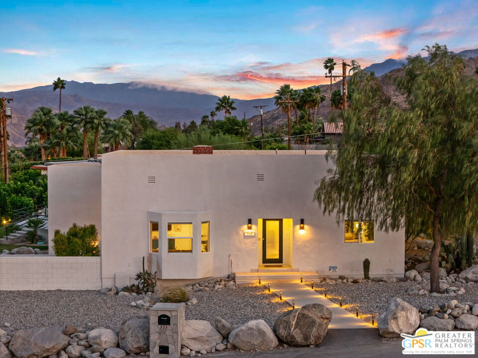 775 West Racquet Club Road Palm Springs, CA 92262 - Photo 7 of 44 an aerial view of a house with a yard fire pit and outdoor seating