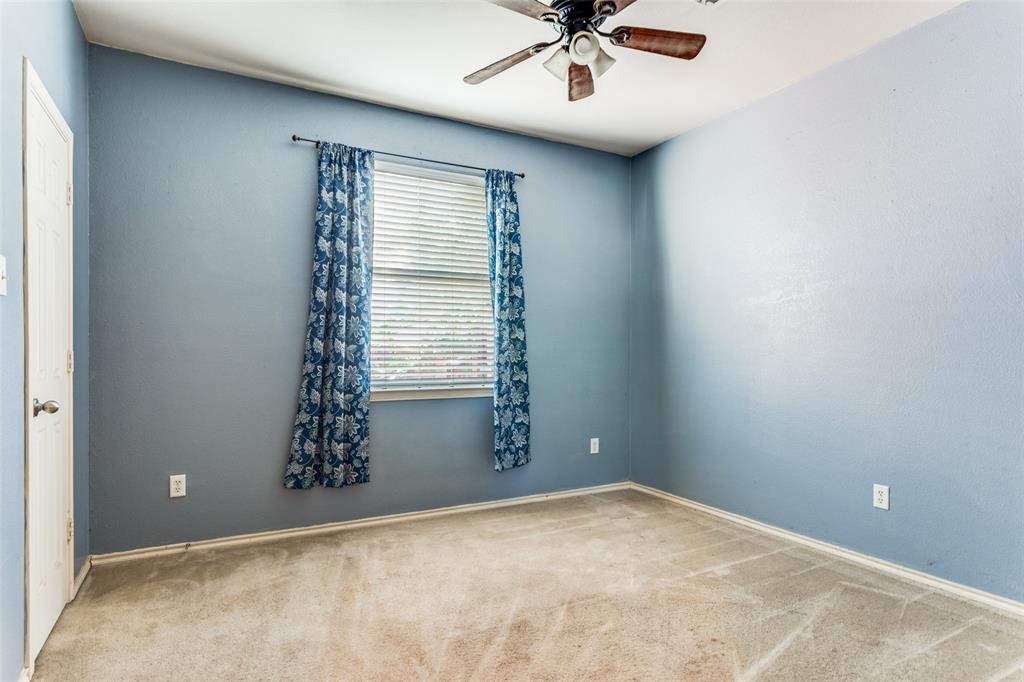 819 Hickory Street Burleson, TX 76028 - Photo 13 of 24 an empty room with a window