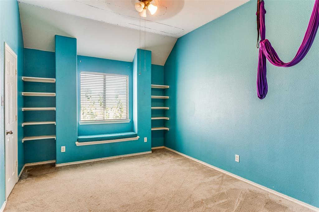 819 Hickory Street Burleson, TX 76028 - Photo 20 of 24 a view of an empty room with a window