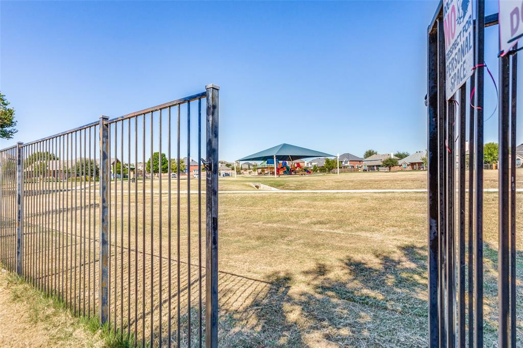 819 Hickory Street Burleson, TX 76028 - Photo 24 of 24 a view of a balcony with ocean view