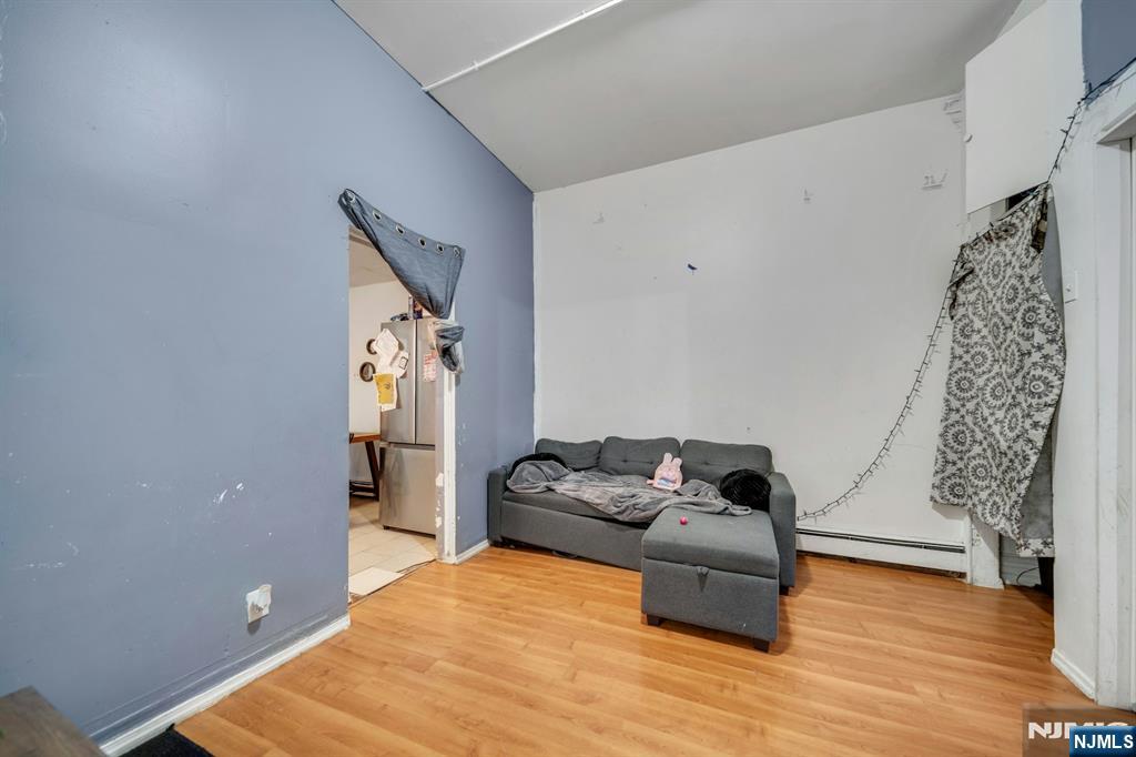 41 Heckel Street Belleville, NJ 07109 - Photo 3 of 38 a bedroom with a bed and a couch