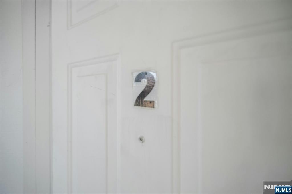 41 Heckel Street Belleville, NJ 07109 - Photo 33 of 38 a white cabinet with a shower