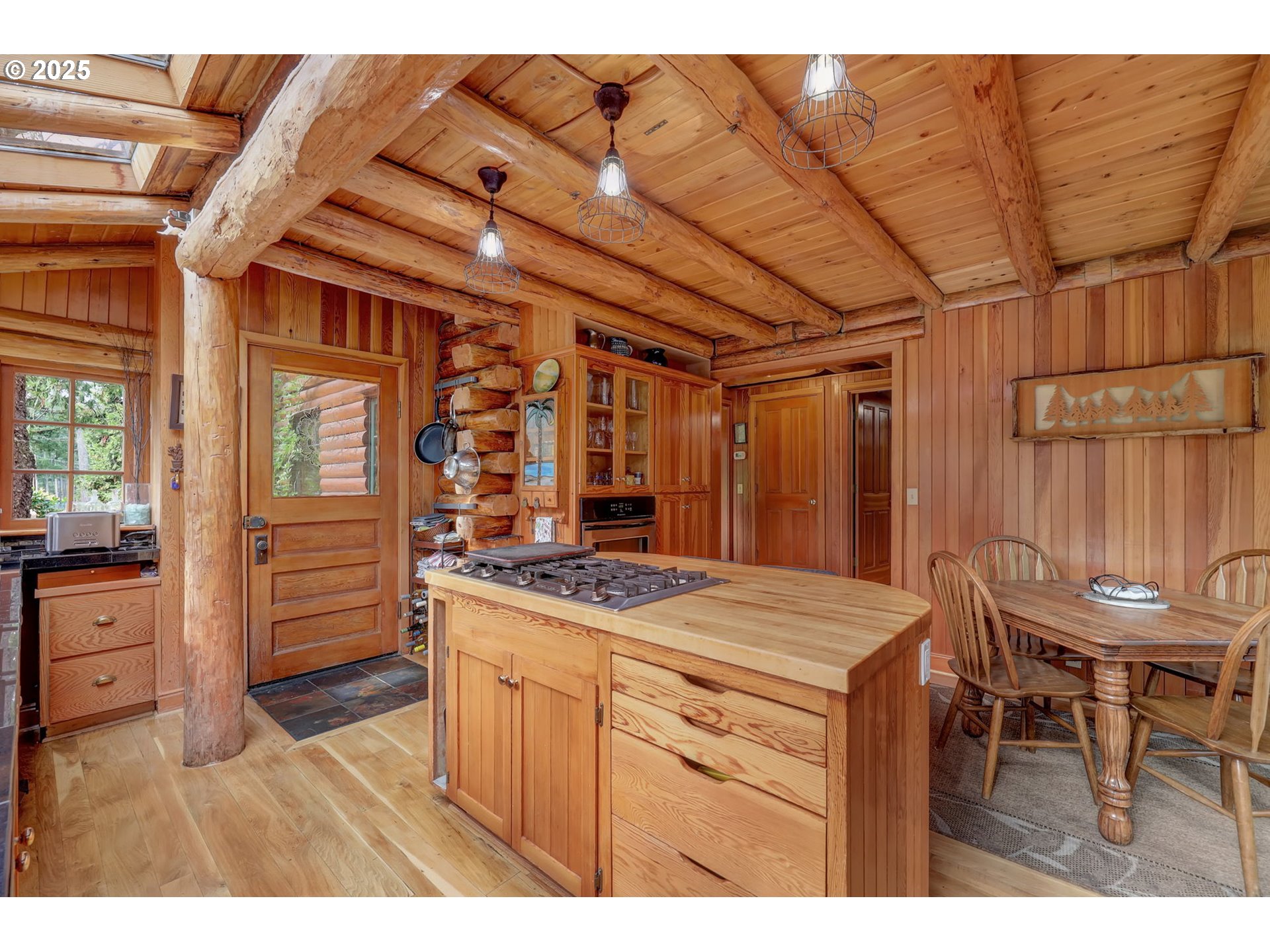 84771 Murdock Road Eugene, OR 97405 - Photo 20 of 46 a kitchen that has a cabinets and wooden floor