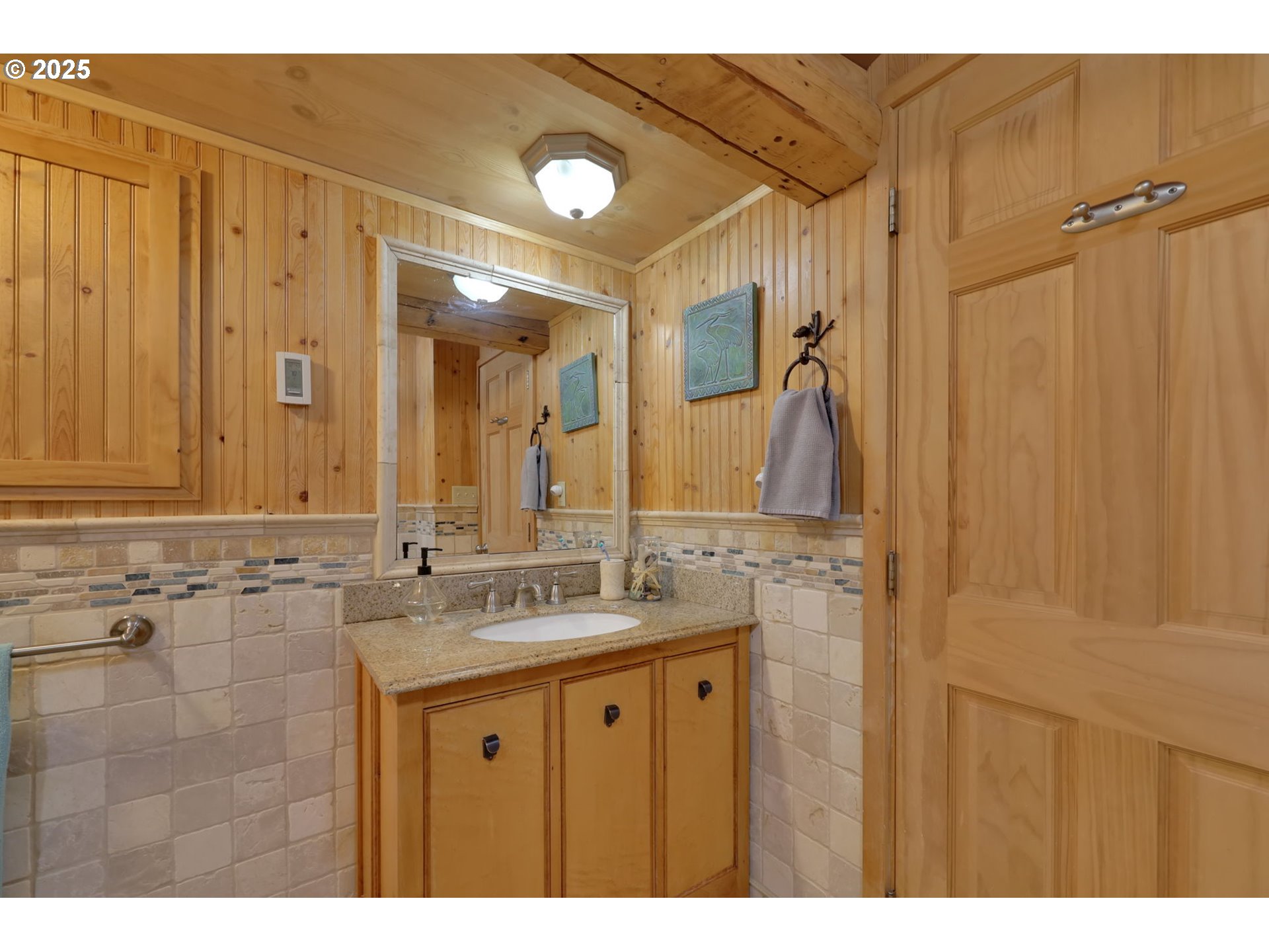 84771 Murdock Road Eugene, OR 97405 - Photo 26 of 46 a bathroom with a granite countertop sink mirror and double