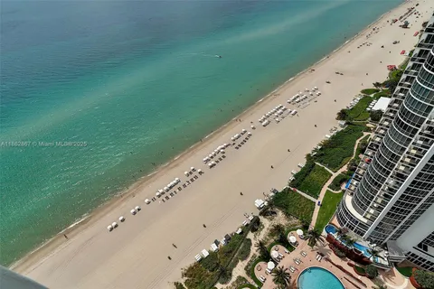 a view of bathroom with washer and dryer