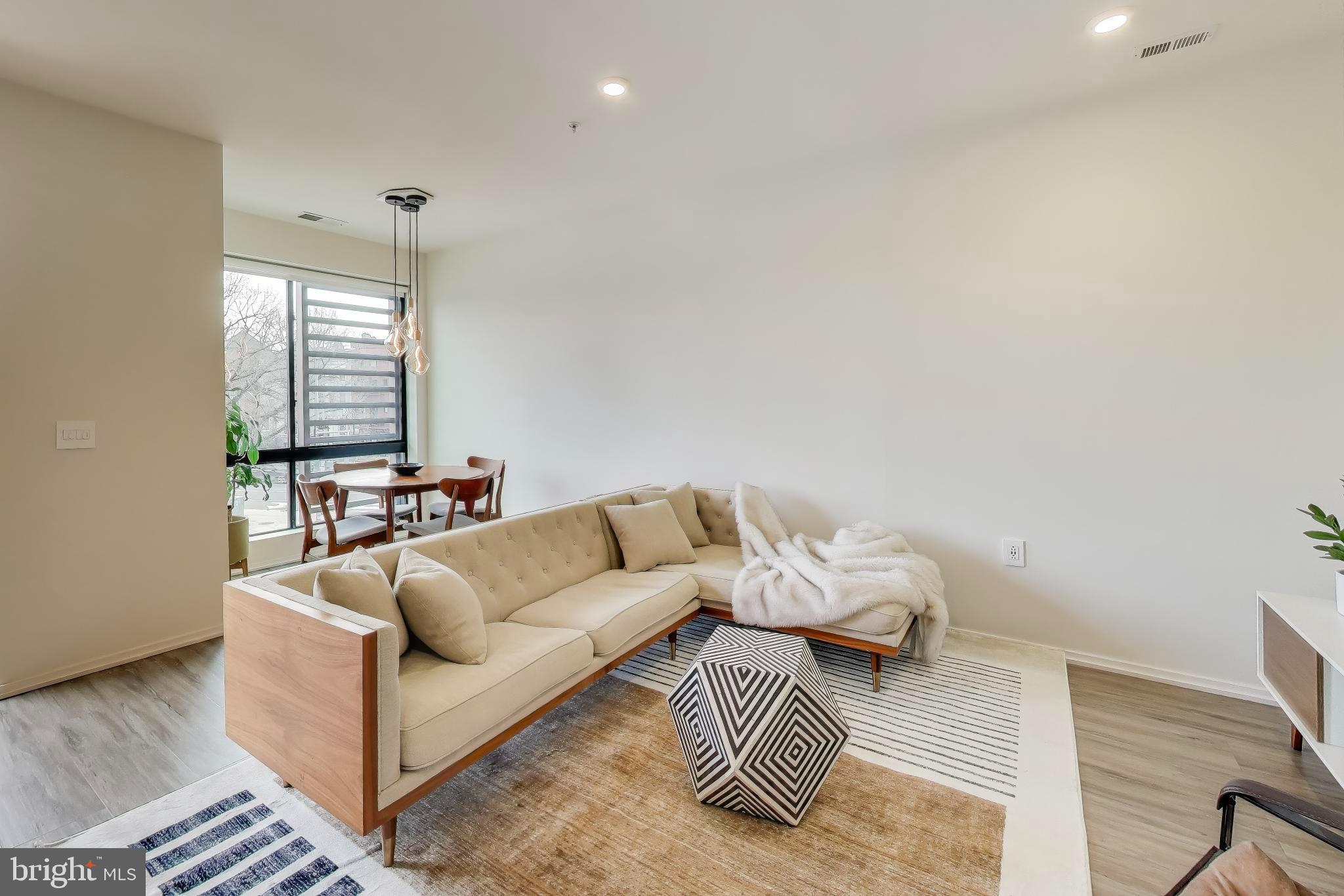 1550 11th Street Northwest, Unit 203 Washington, DC 20005 - Photo 11 of 35 Modern elegance in a bright living space.