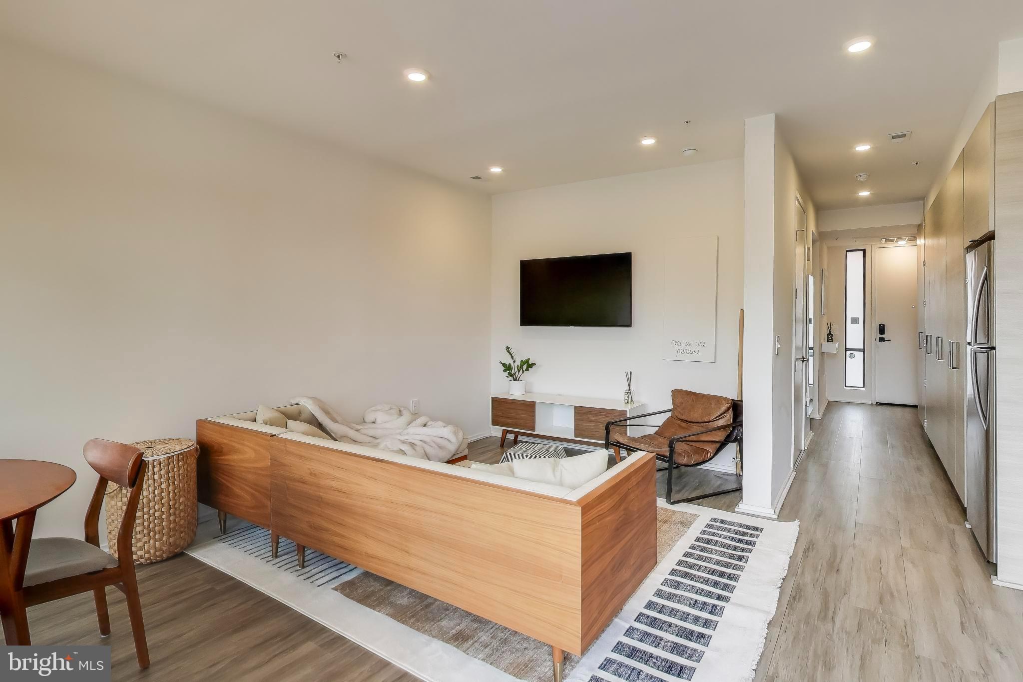 1550 11th Street Northwest, Unit 203 Washington, DC 20005 - Photo 12 of 35 Modern elegance in a bright living space.