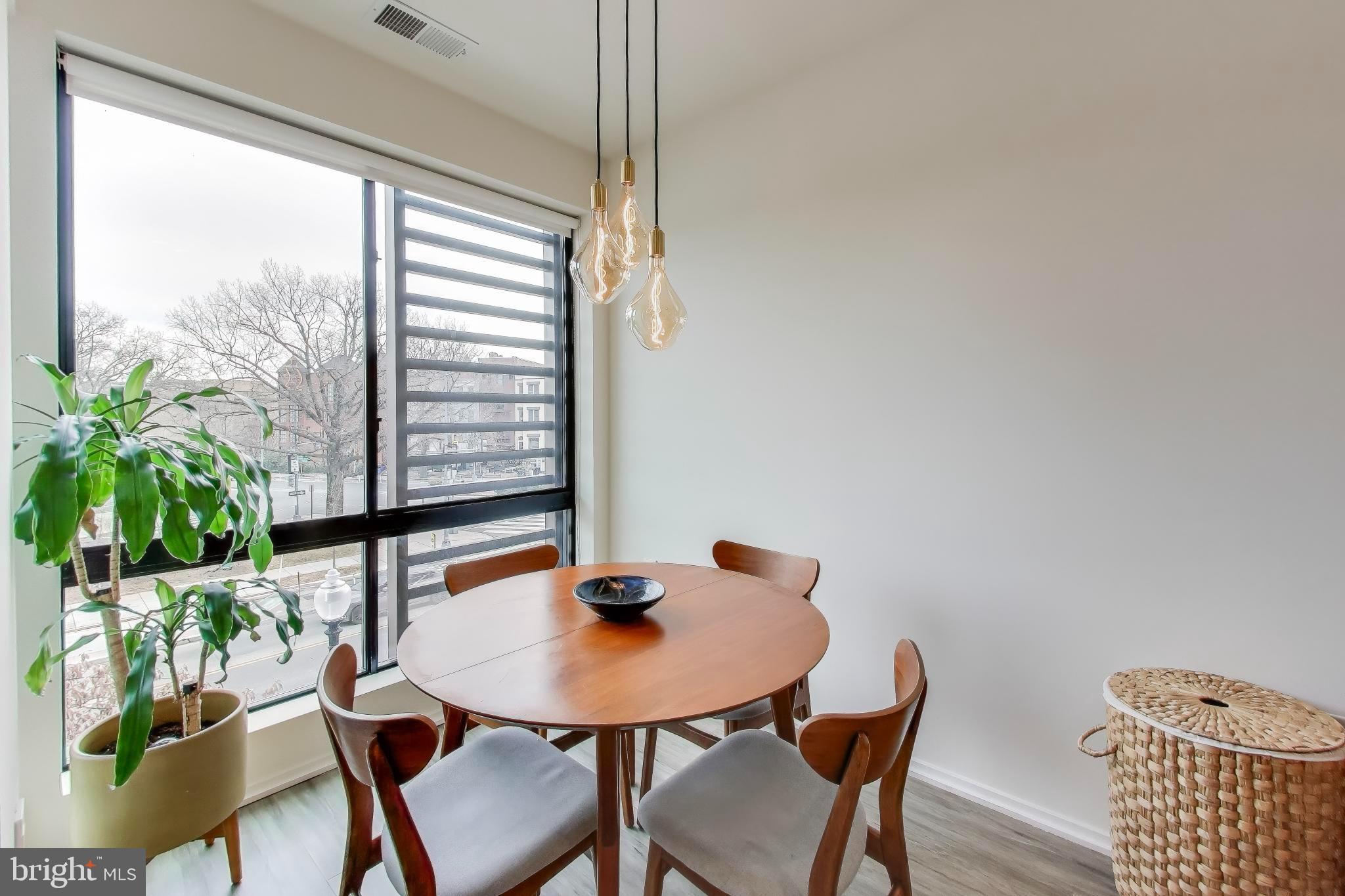 1550 11th Street Northwest, Unit 203 Washington, DC 20005 - Photo 14 of 35 Bright dining nook with modern charm.