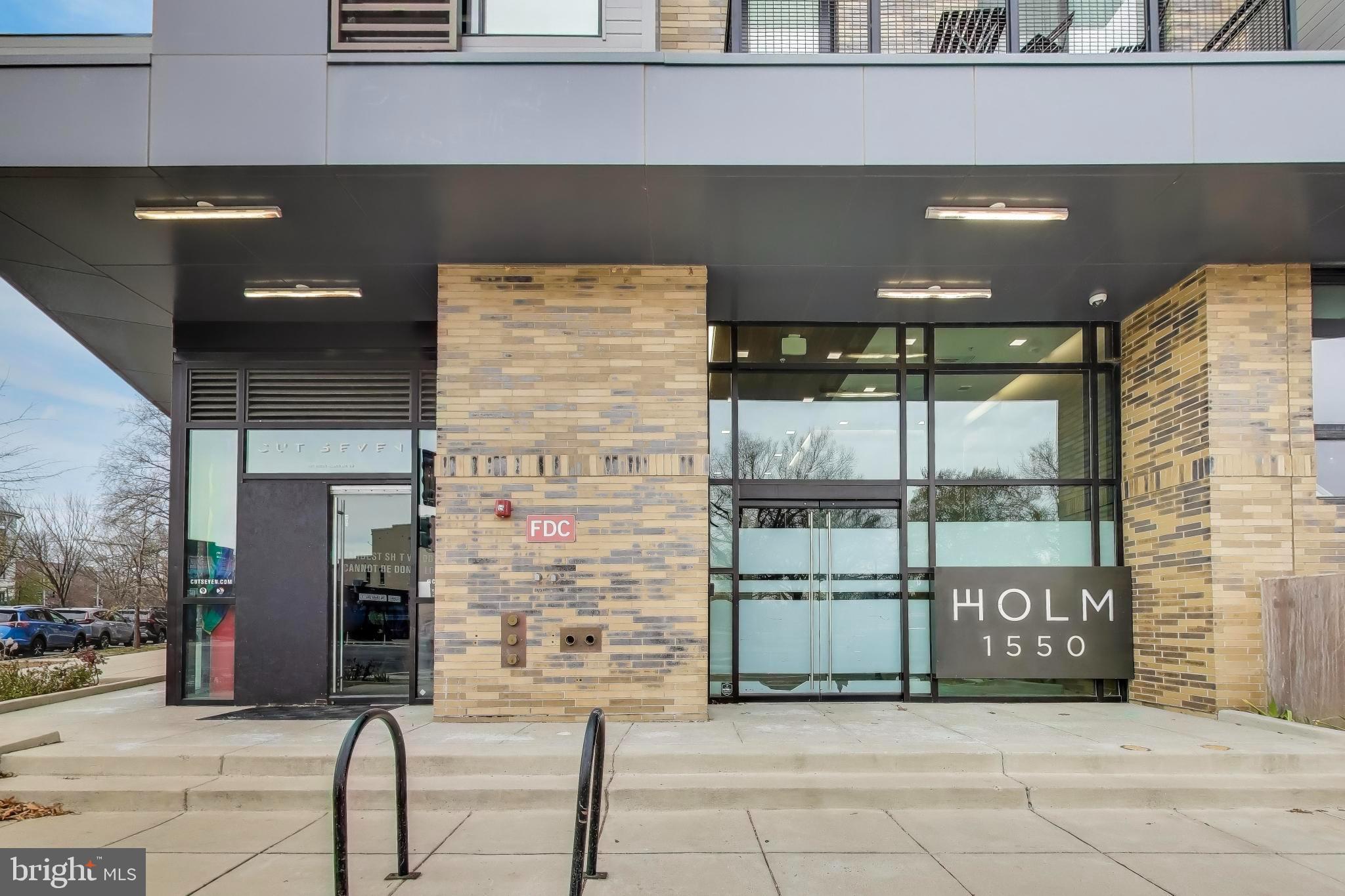 1550 11th Street Northwest, Unit 203 Washington, DC 20005 - Photo 4 of 35 Modern urban entrance at Holm 1550.