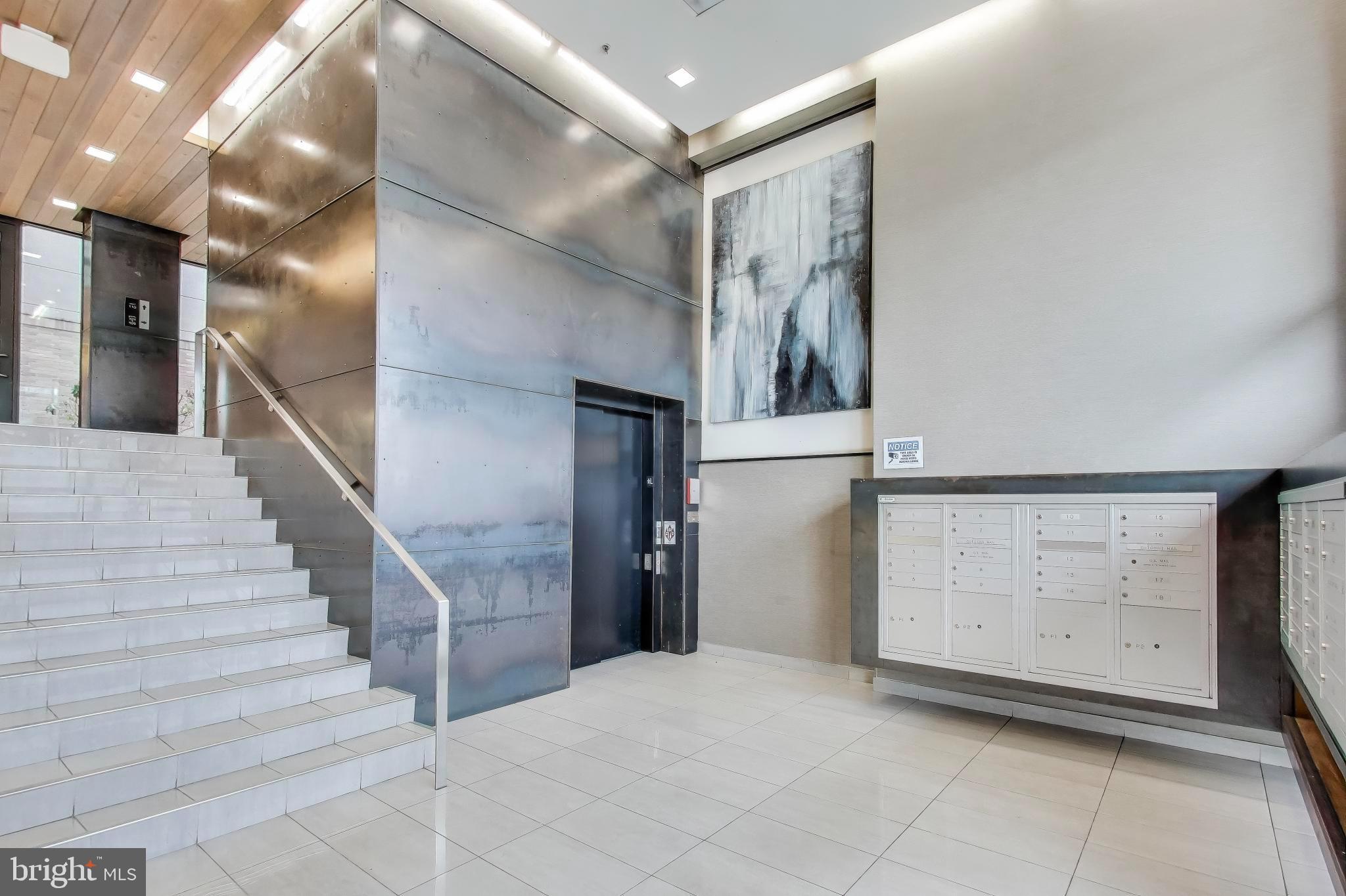 1550 11th Street Northwest, Unit 203 Washington, DC 20005 - Photo 5 of 35 Sleek lobby with modern design elements.